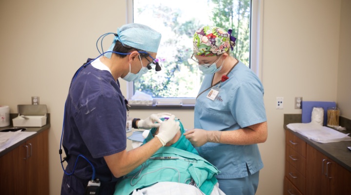 Dermatologist performing Mohs surgery